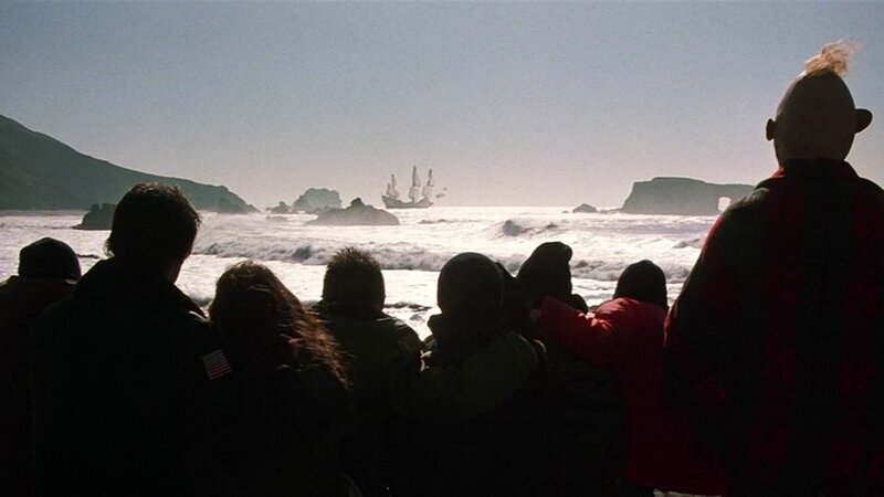 people watching ship at sea