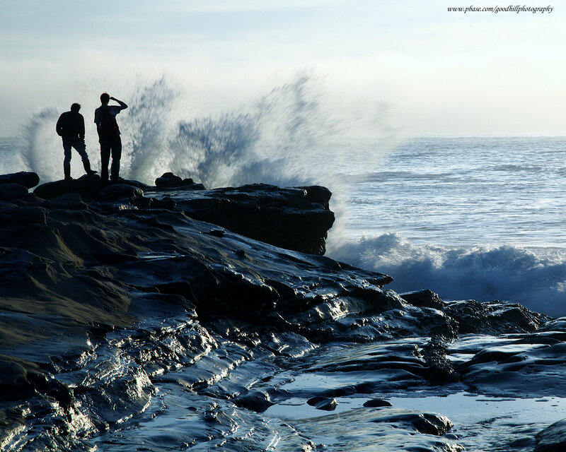 People watching waves crash