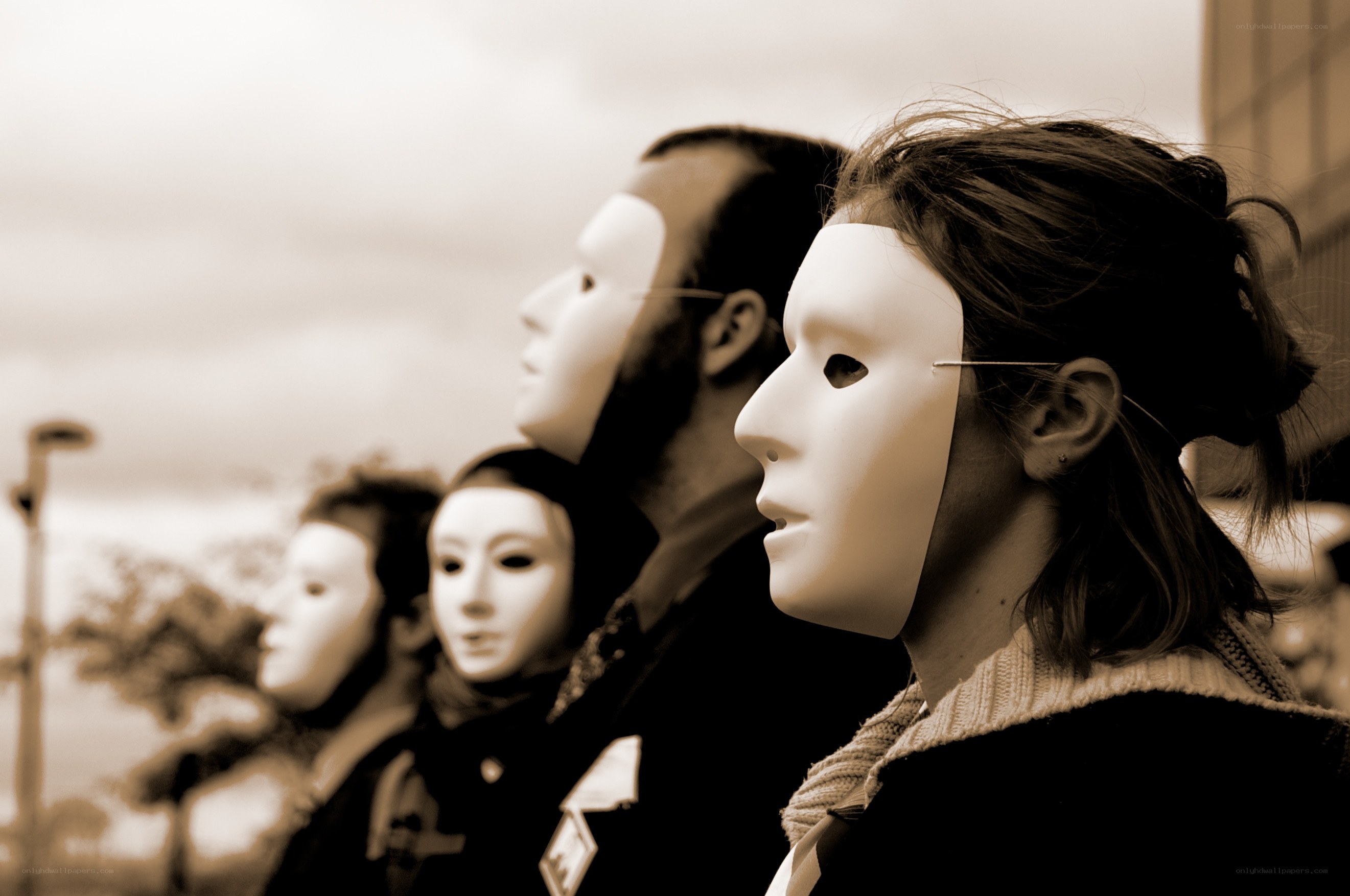 people wearing white masks