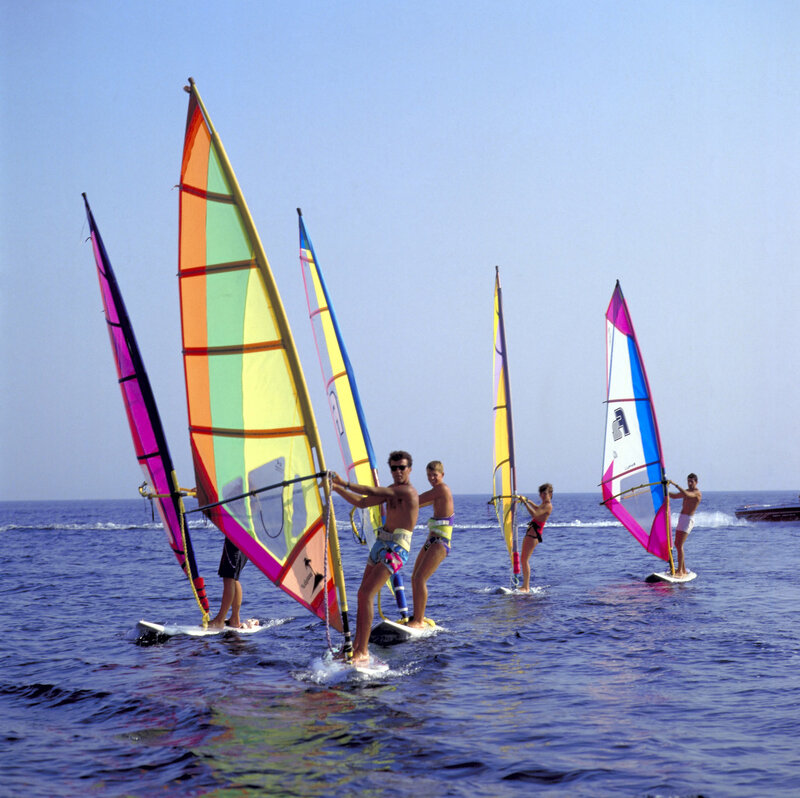 People Windsurfing