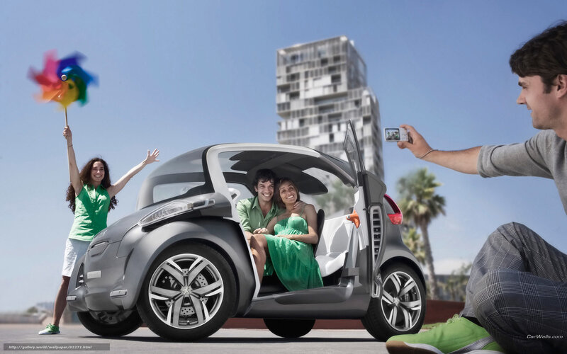 People with a futuristic car
