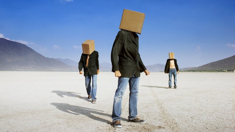 People with boxes on heads