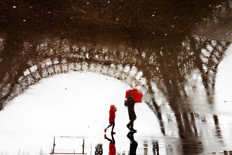 People with Red Umbrellas