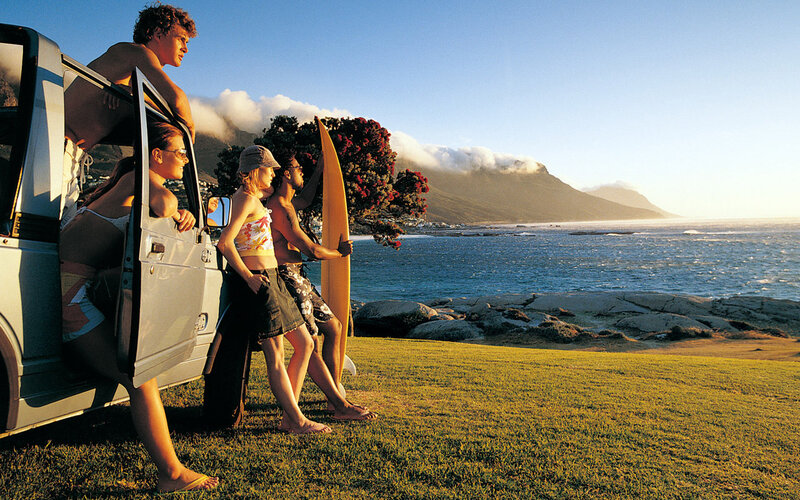 People with Surfboards