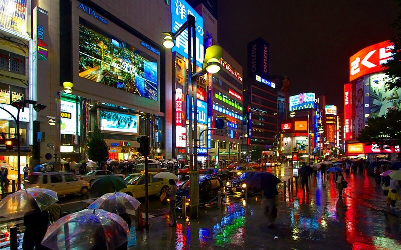People with Umbrellas at Night — Red
