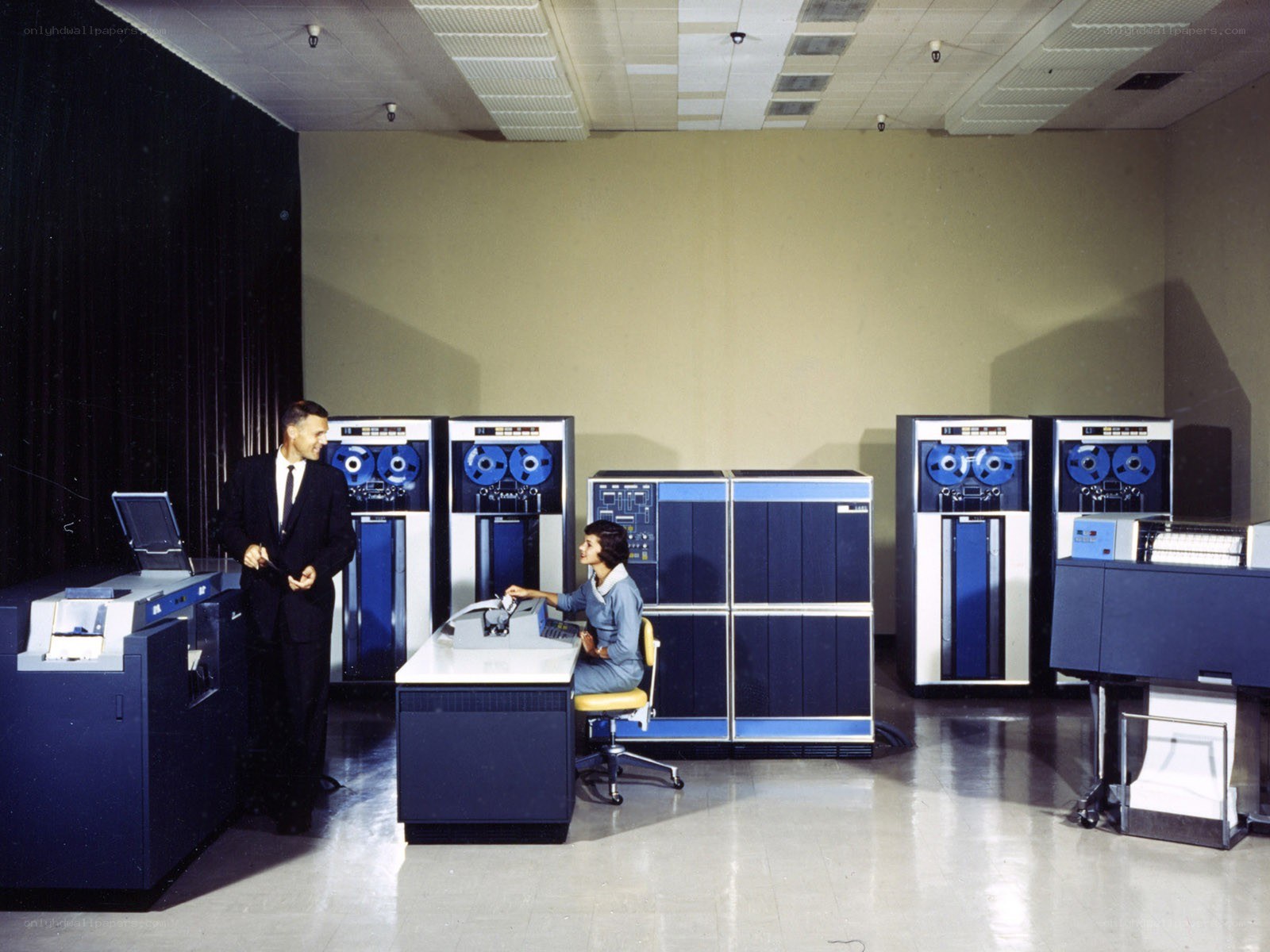 People with vintage computer system