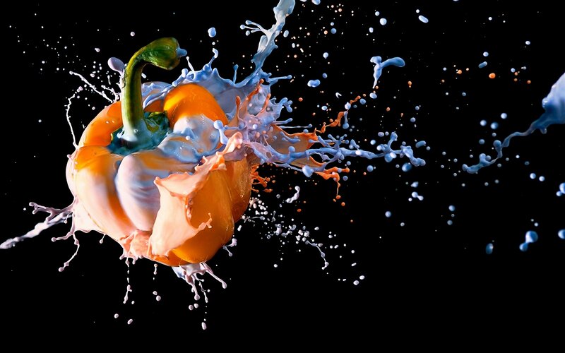 pepper splashing with liquid