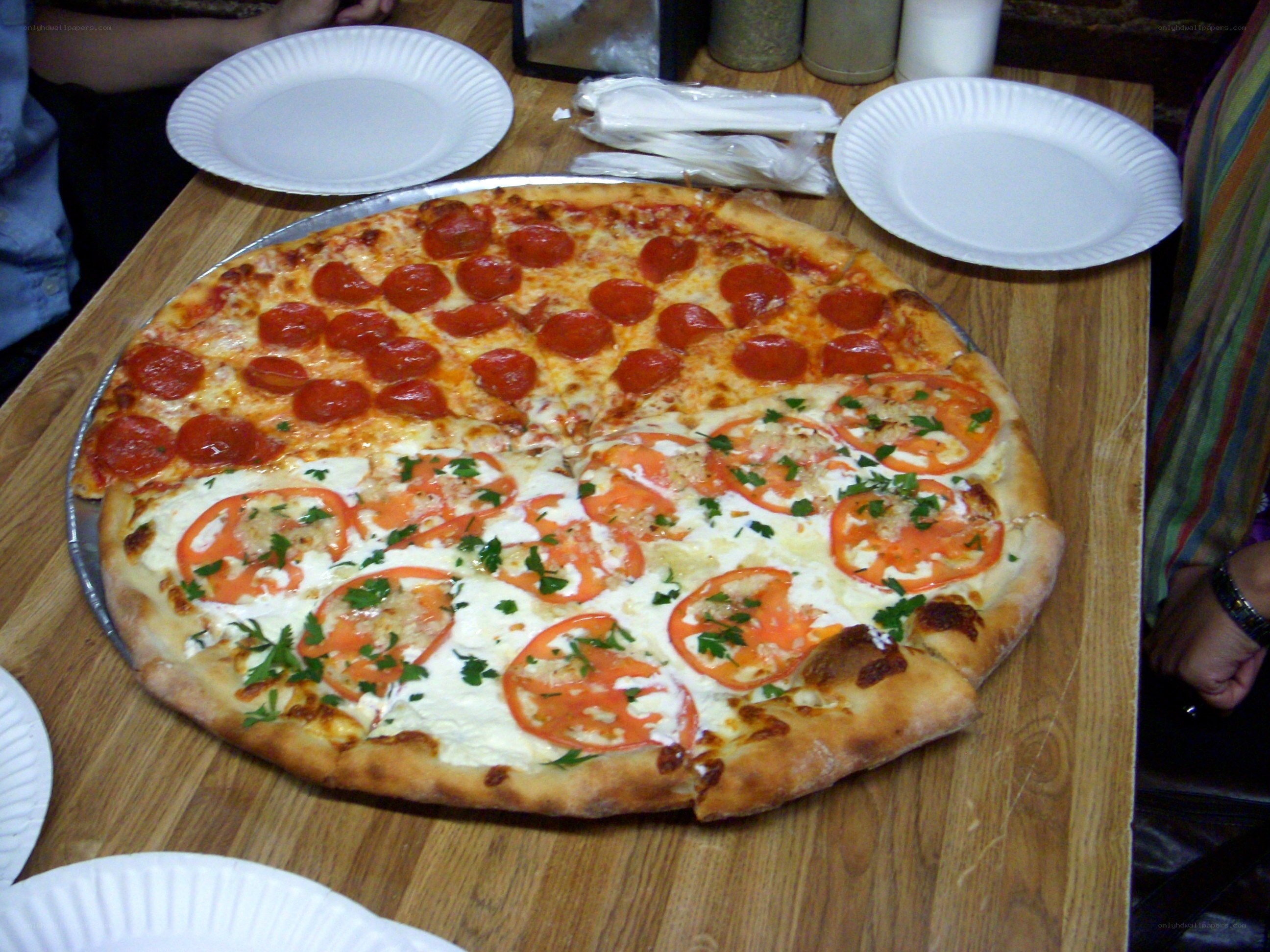 Pepperoni and tomato pizza