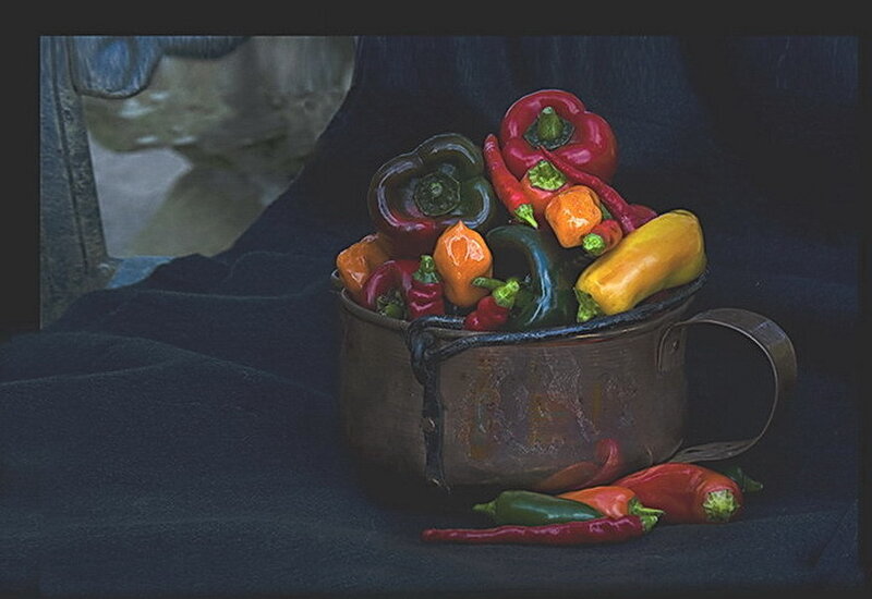 peppers in a copper pot