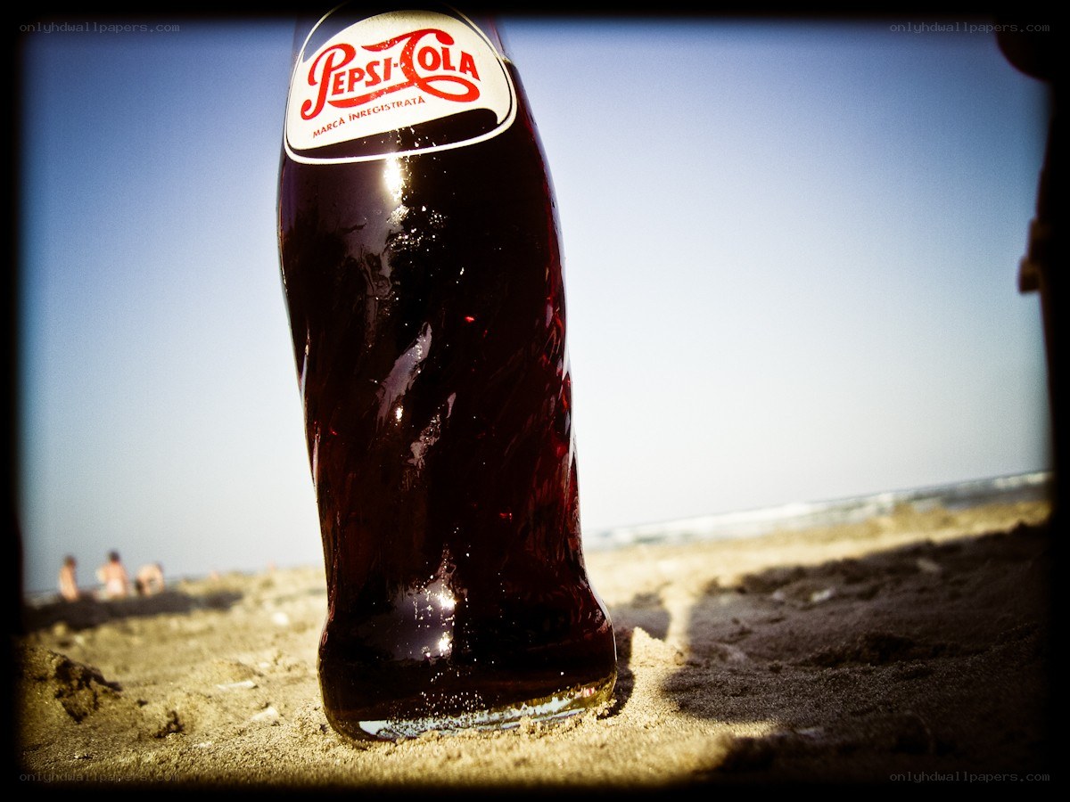 Pepsi bottle on a beach