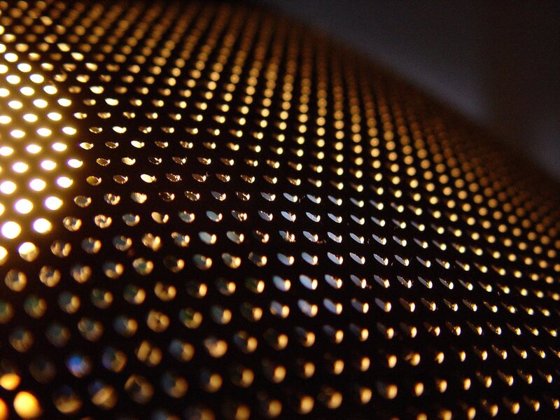 Perforated Metal Surface — Black, Dramatic