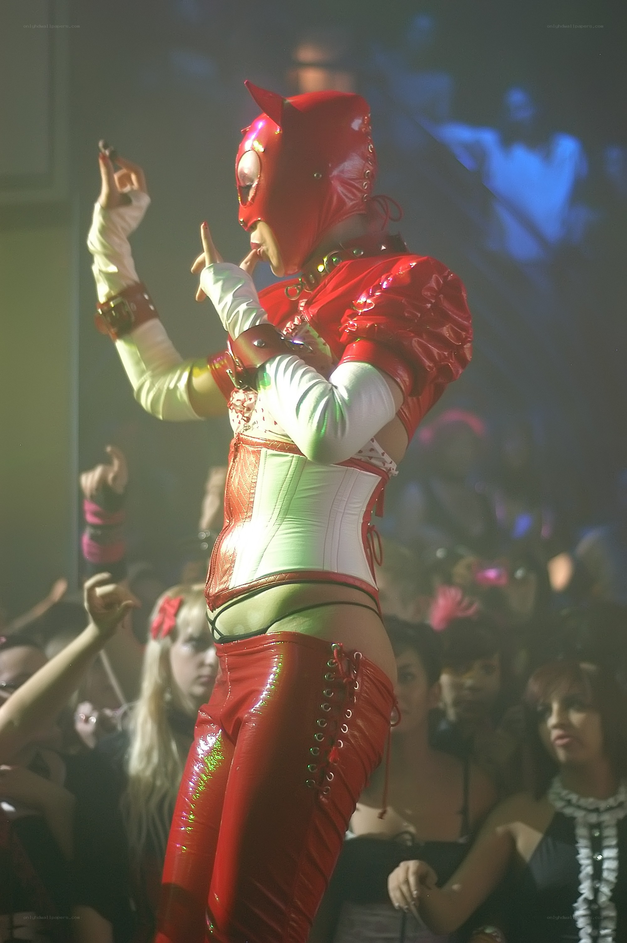performer in red costume on stage