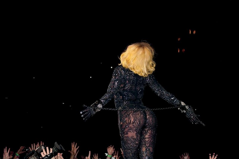 performer on stage with crowd