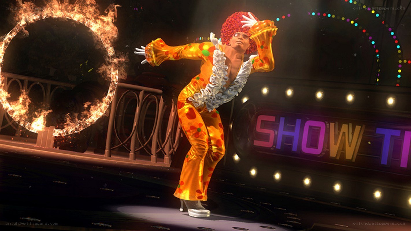 performer on stage with fire