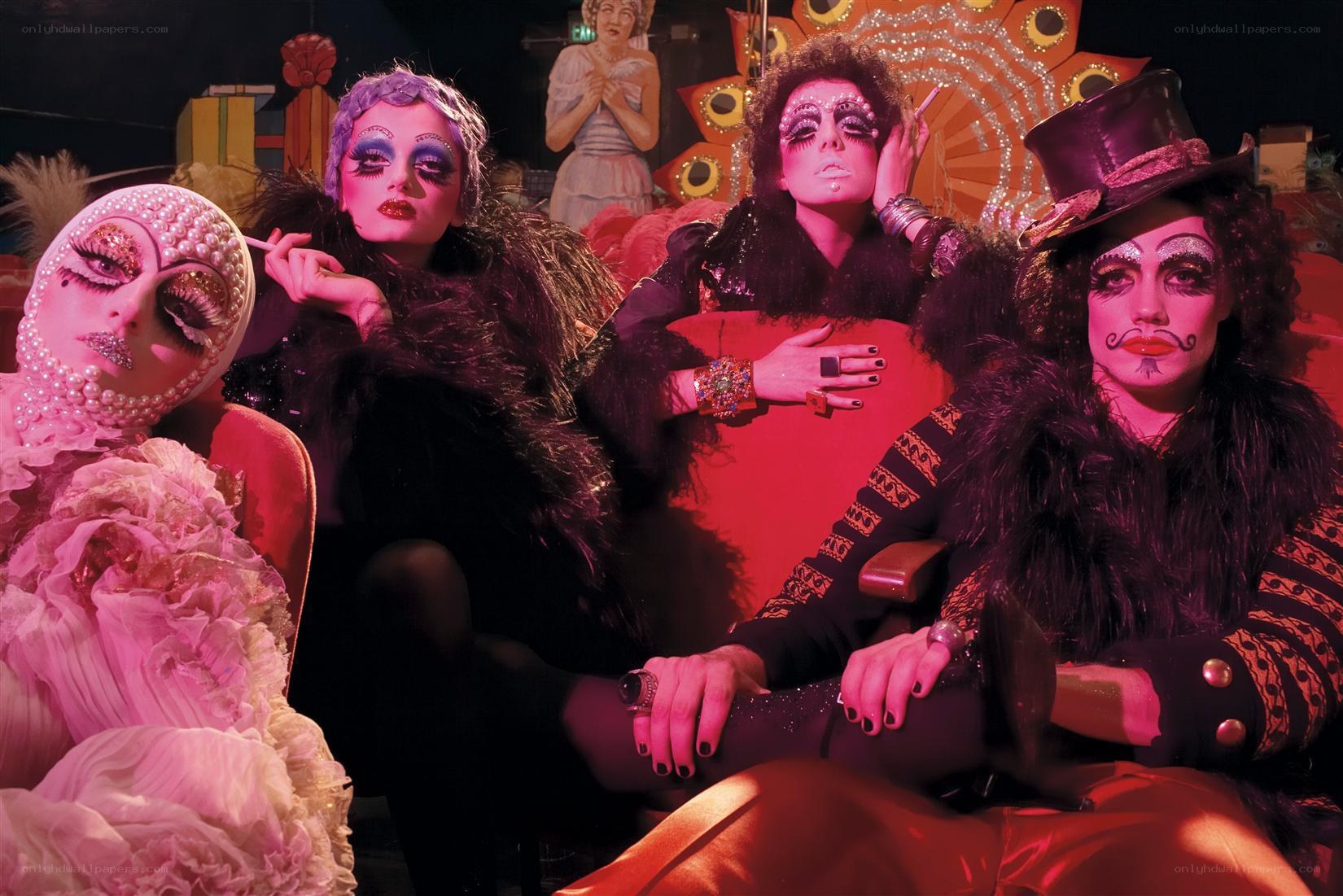 Performers in theatrical makeup