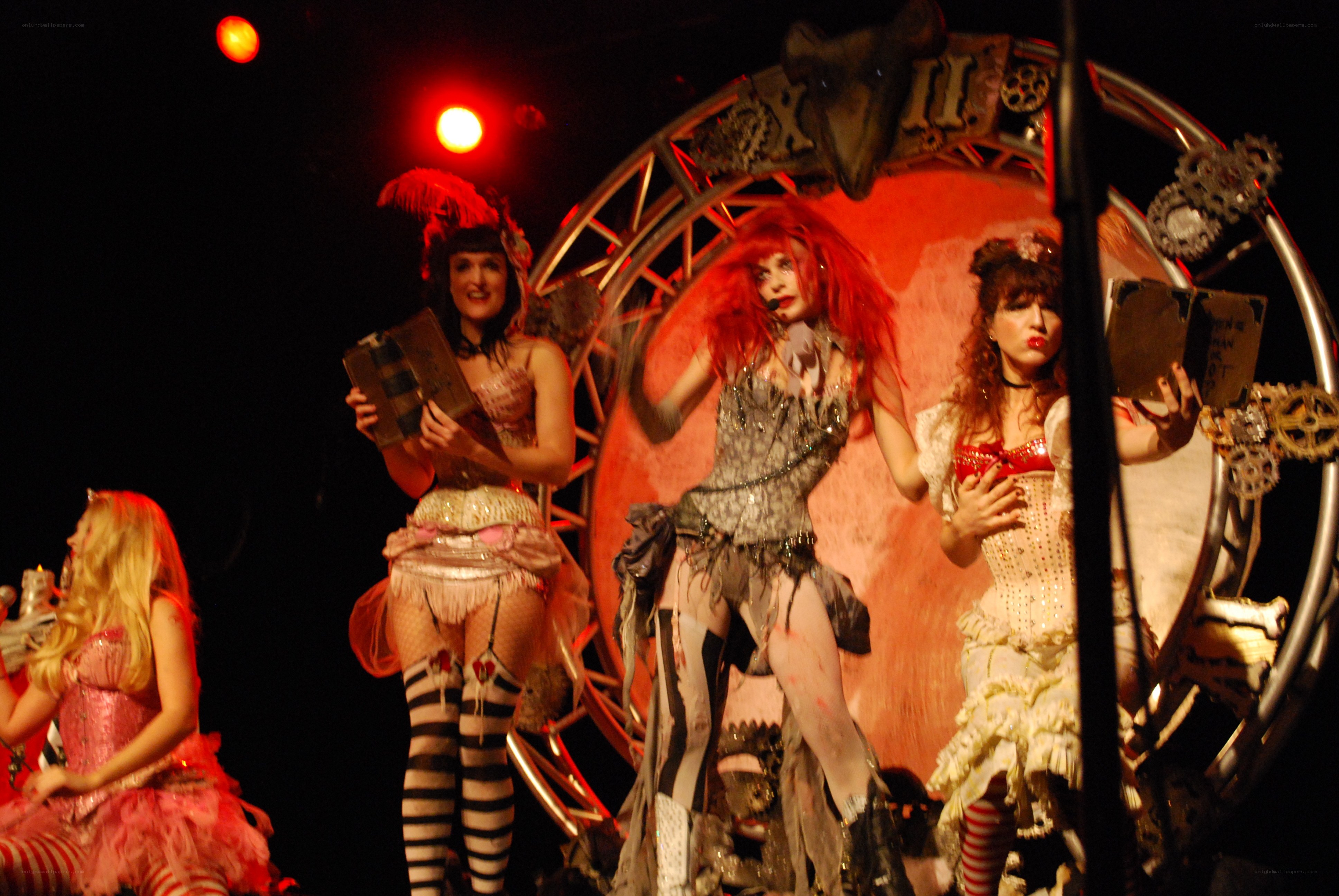 Performers on a theatrical stage