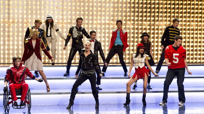 Performers on Stage — Gold