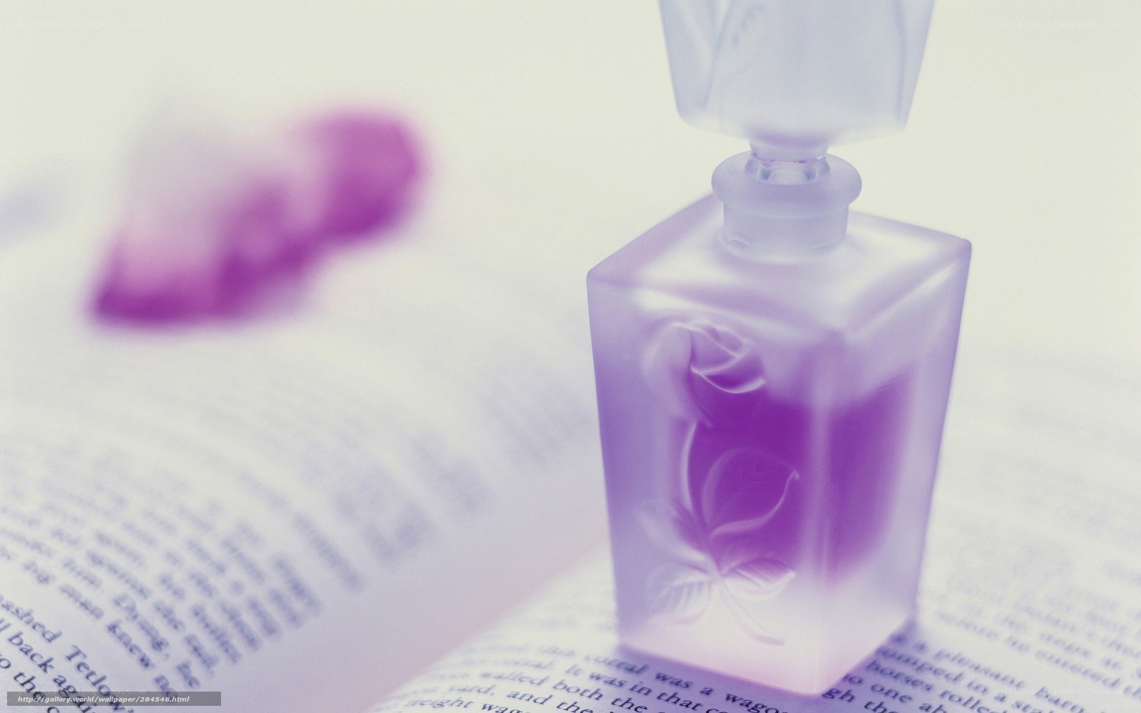 perfume bottle on book page