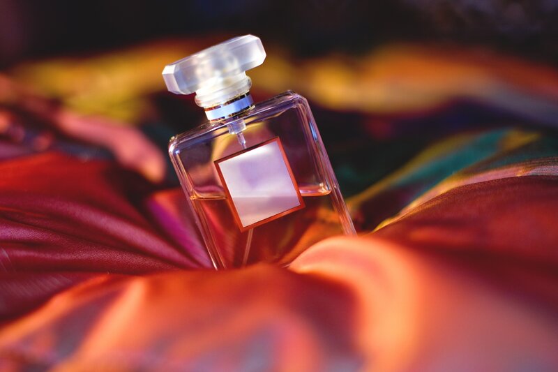 Perfume Bottle on Fabric — Red