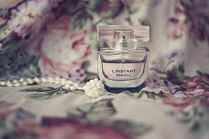 Perfume Bottle on Fabric — White