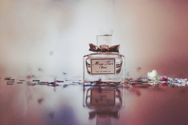 Perfume Bottle on Surface — Pink