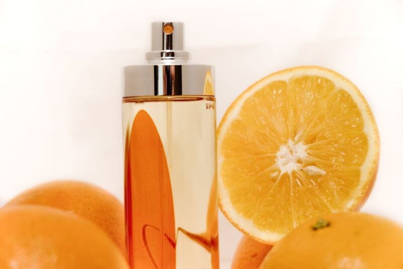 Perfume Bottle with Oranges