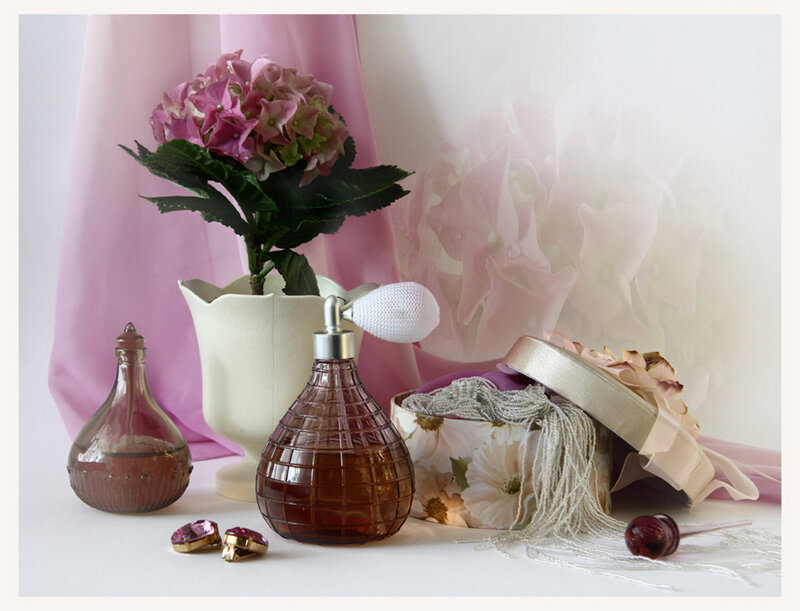 Perfume Bottles and Flowers