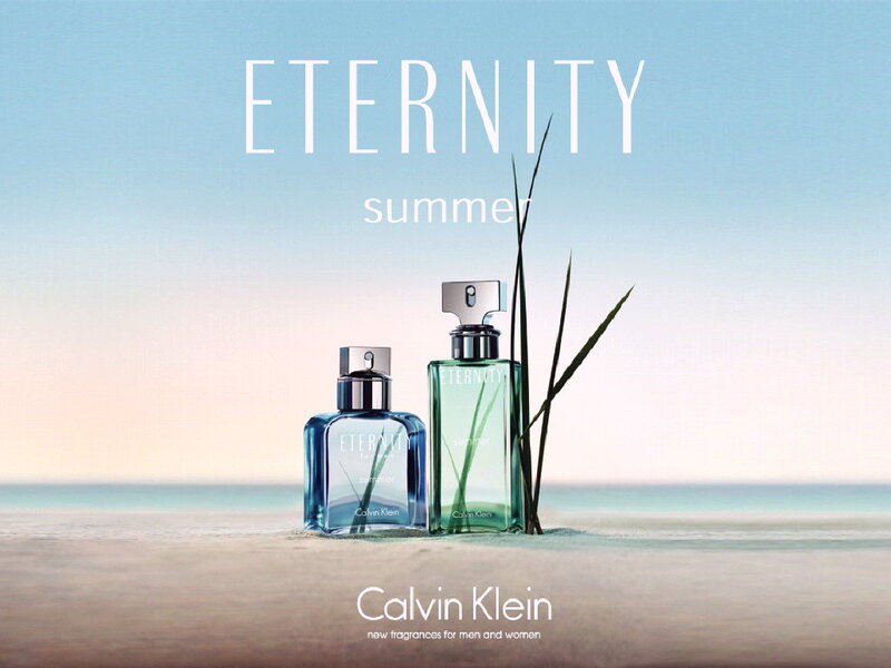 Perfume Bottles on Beach — Blue