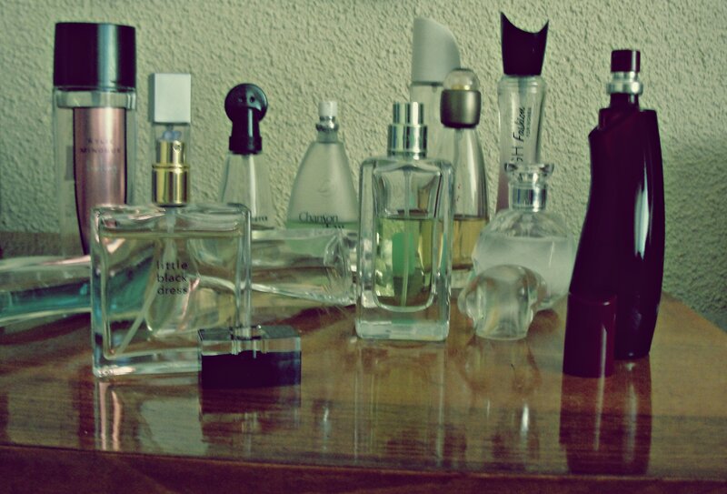 Perfume Bottles on Table — Brown