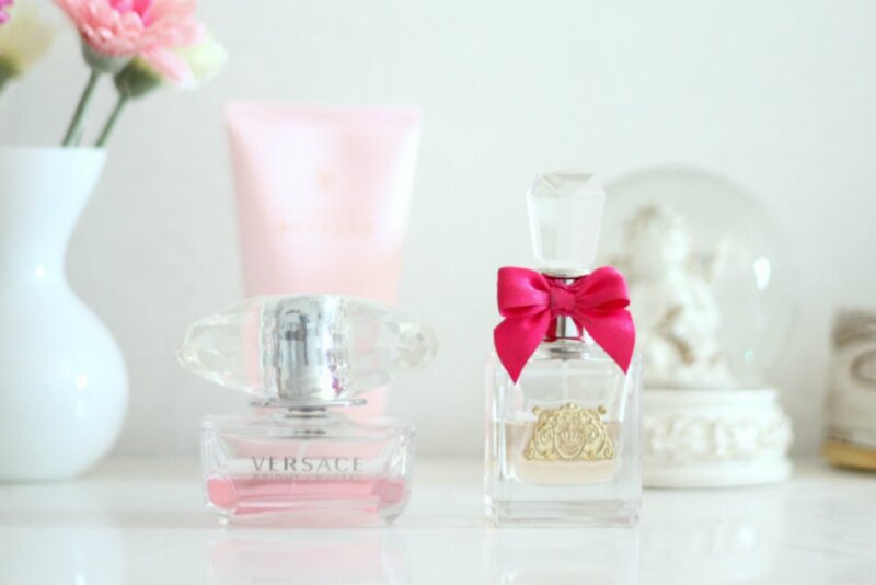 Perfume Bottles on Table — White