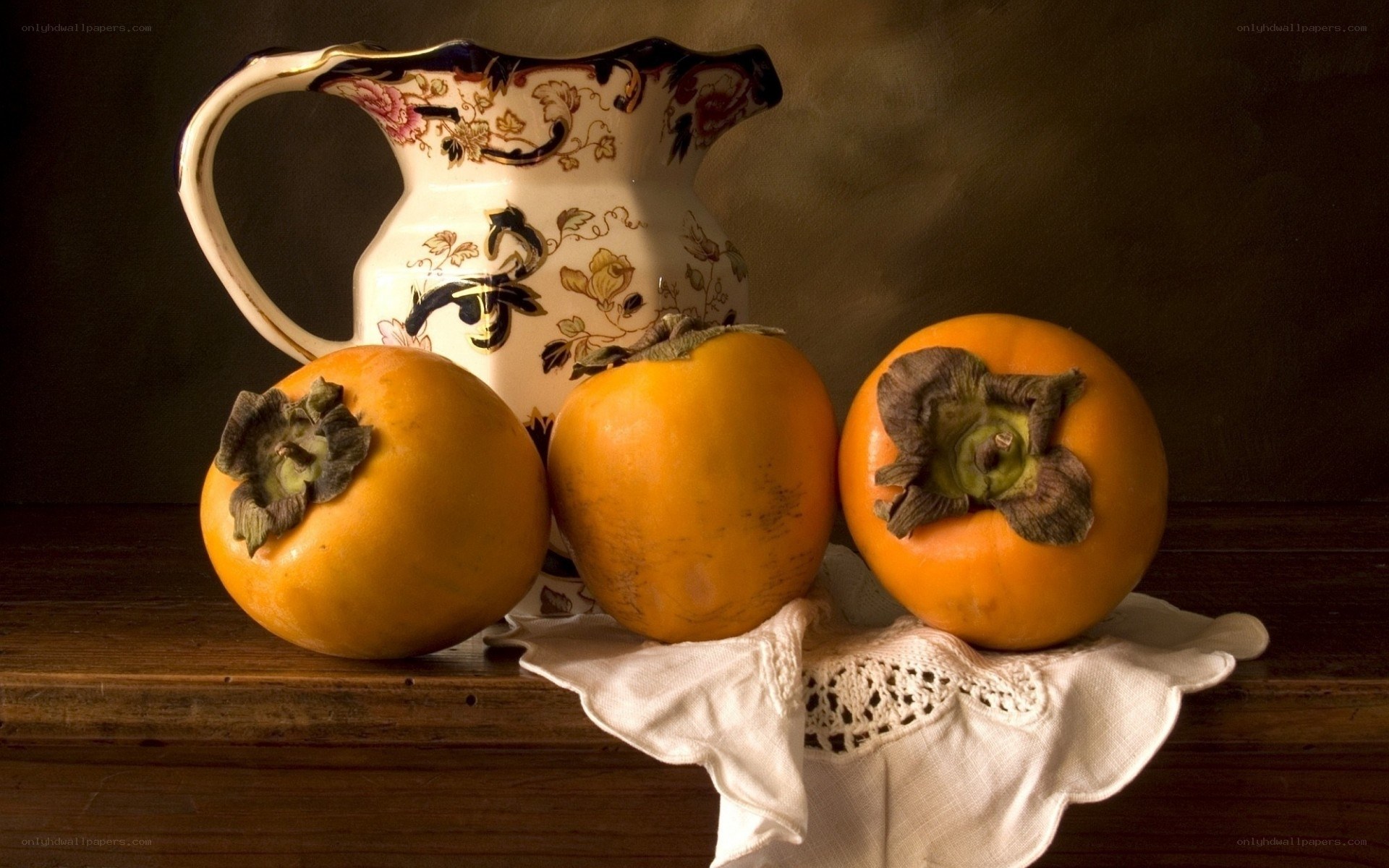 Persimmons and pitcher still life