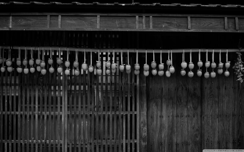 Persimmons Hanging on Wood