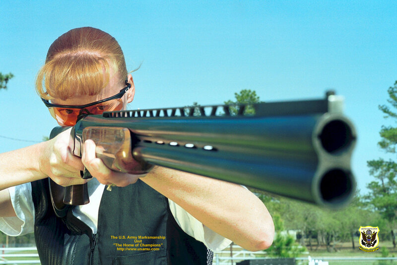 Person Aiming Shotgun