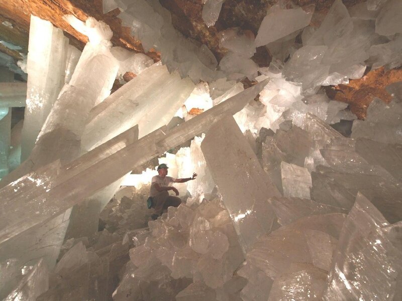 Person among giant crystals