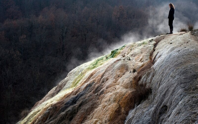 Person at a geothermal spring