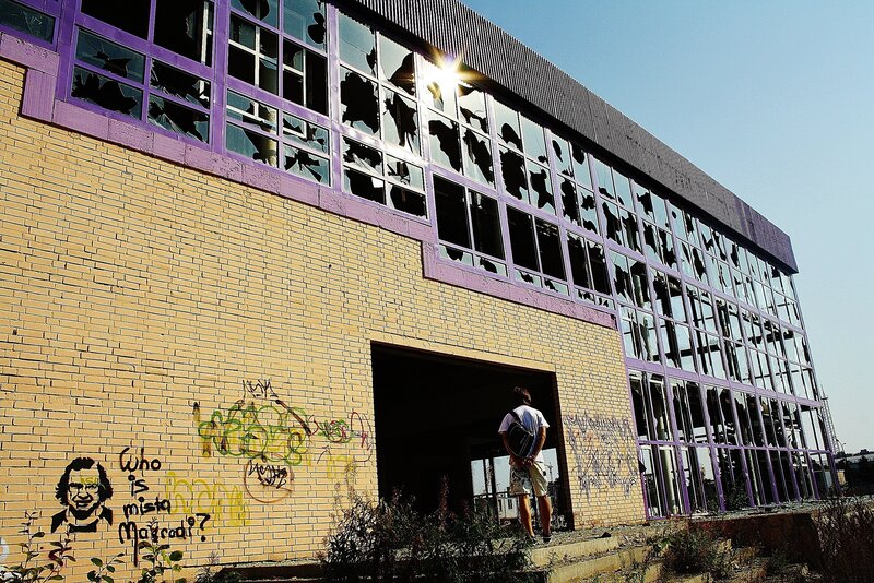 Person at Abandoned Building