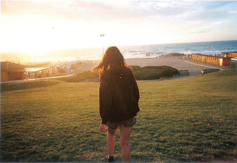 Person at beach sunset
