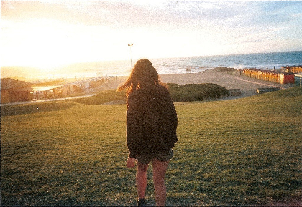 Person at beach sunset