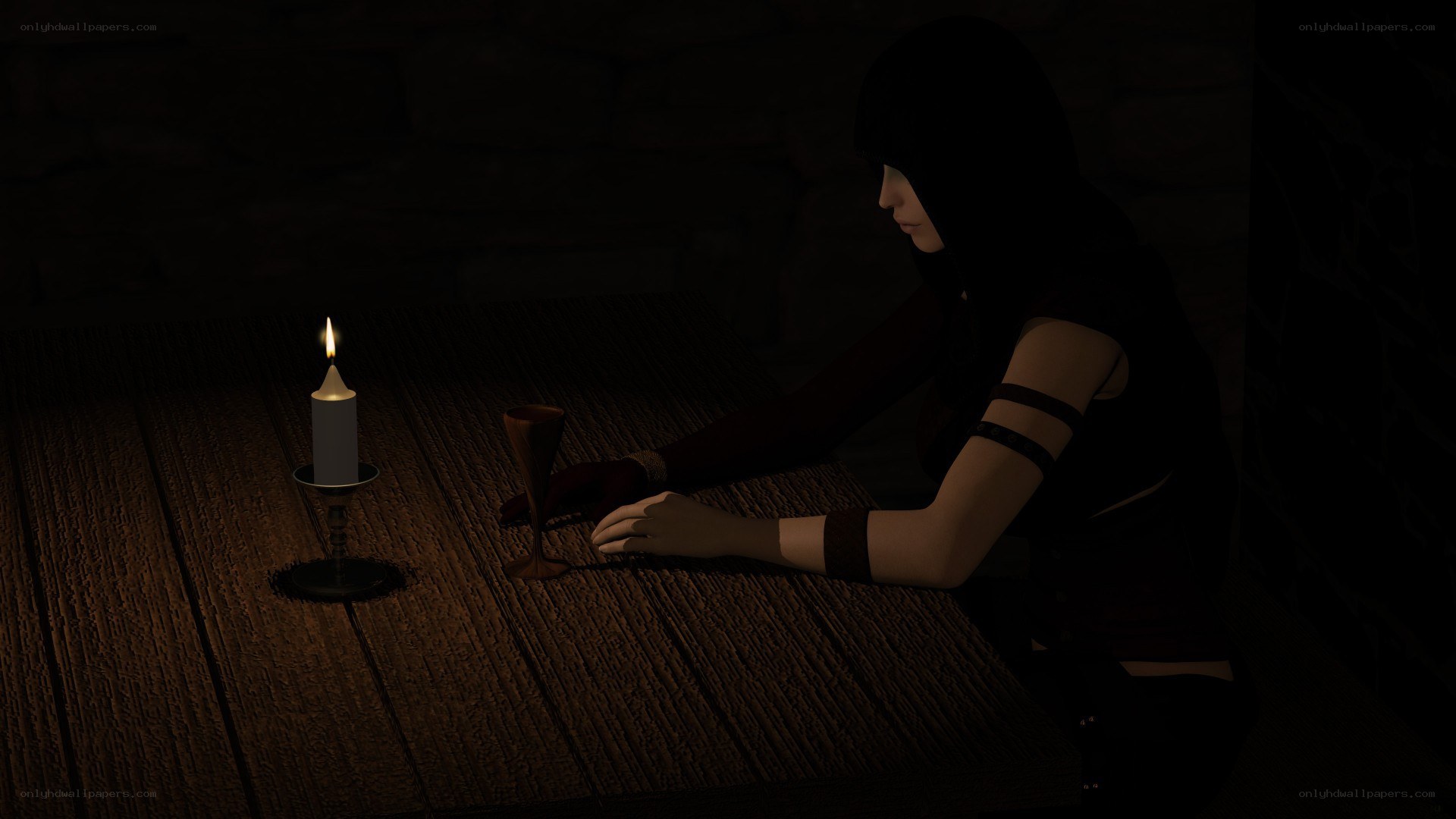 person at candlelit table