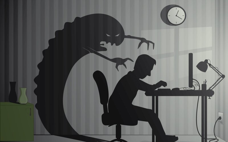 Person at Computer Desk — Black