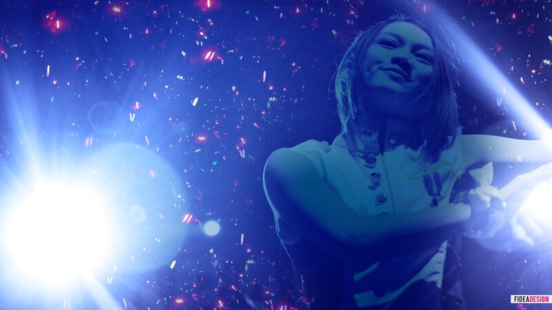 person at concert with confetti