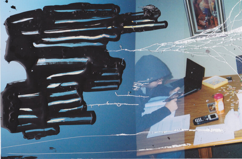 person at desk with paint overlay