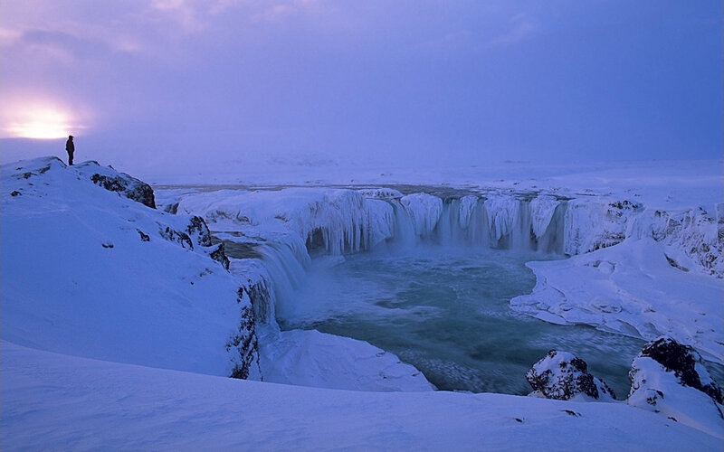 Person at Frozen Waterfall