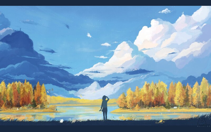 person at lake in autumn