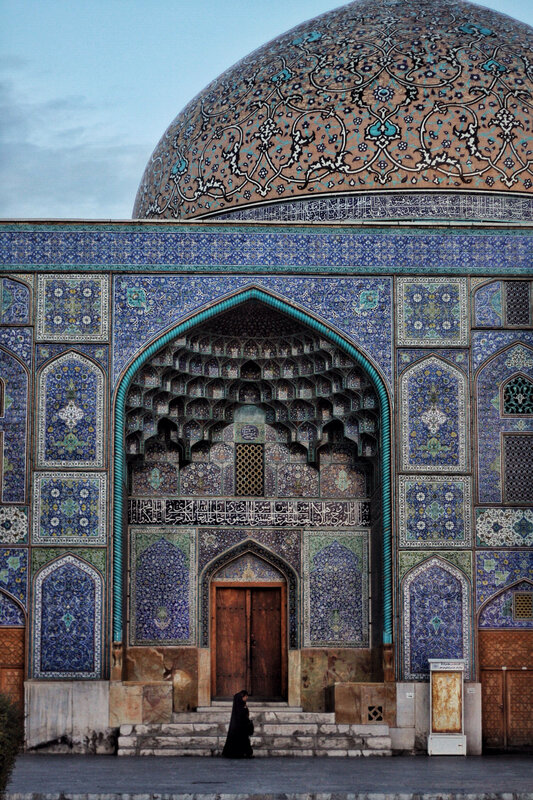 Person at Mosque Entrance