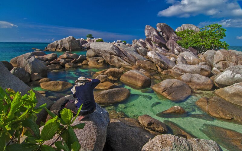 Person at rocky beach