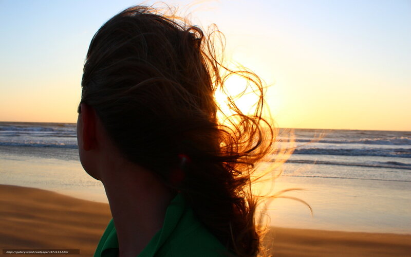 person at sunset on beach