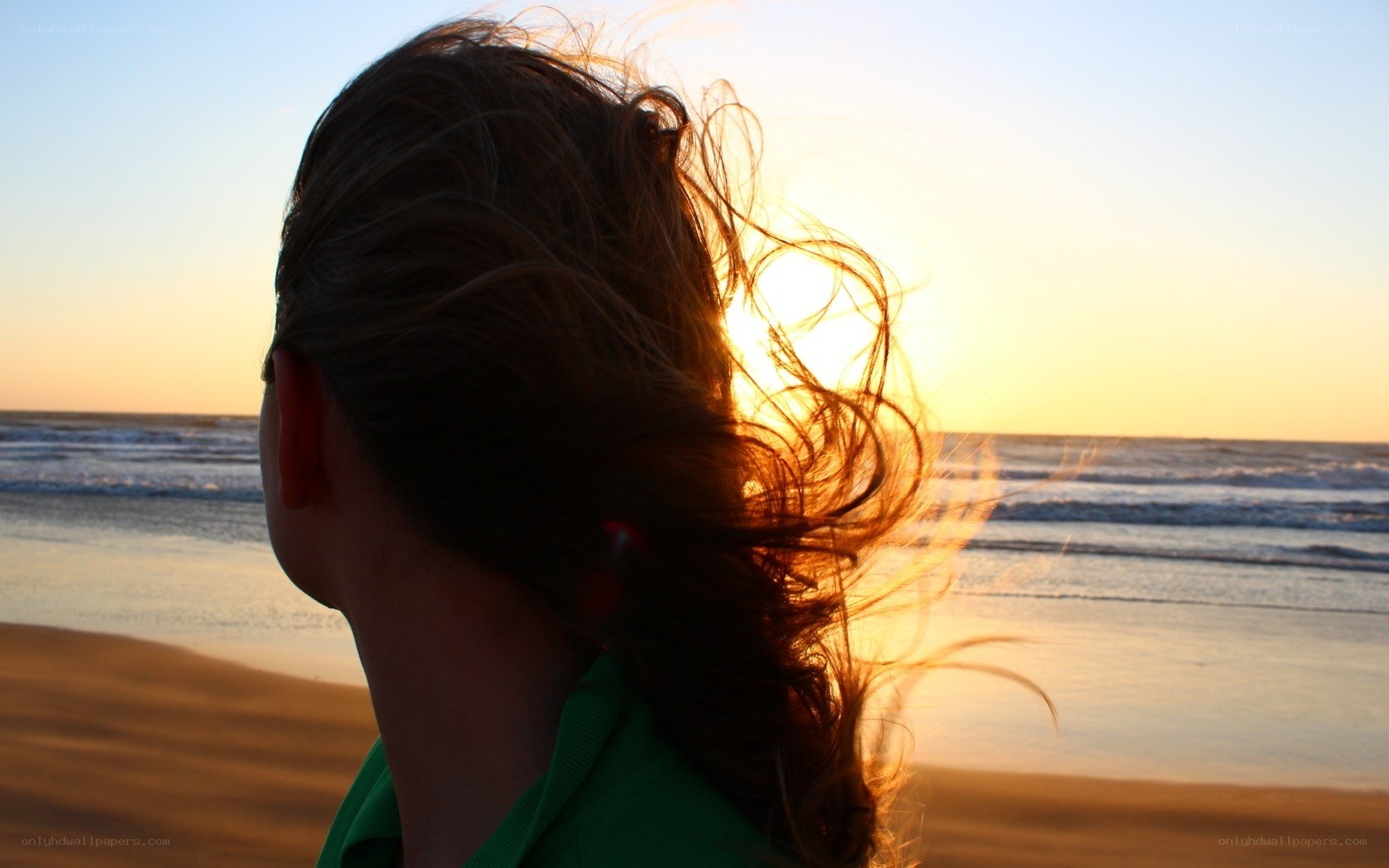 person at sunset on beach