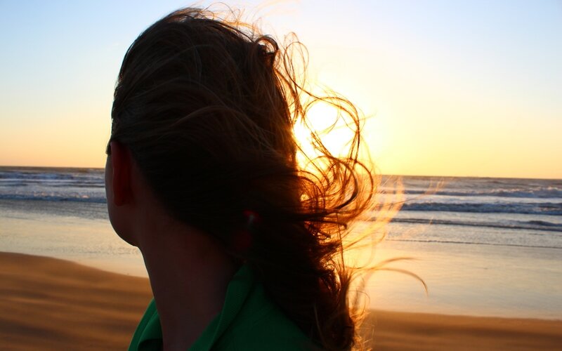 Person at sunset on beach