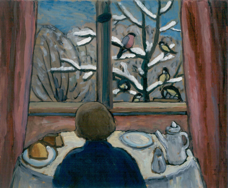 Person at table by window